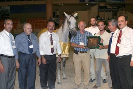 Mr. Mohammad Ghayath Shama; Mr. Hisham Ghoraib; Mr. Basil Jadaan, President of the Syrian Arab Horse Association; David Angold, WAHO Treasurer; Mr. Zakwan Khadam Srouji and Mr. Sohail Zbebi representing the owner and breeder; Mr. Amir Mardini, Syrian Arab Horse Association; Mr. Mohammad Al Wadi, Director, Arabian Horse Office at the Ministry of Agriculture.