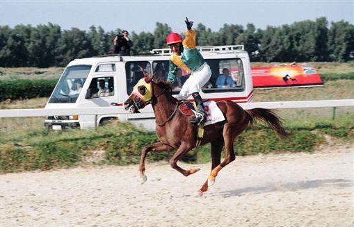 Click to Enlarge - Ourabi winning the Grand Prix of the President of the Republic, 2005.