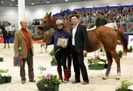 Click to Enlarge - Photo: Dr. Giampaolo Teobaldelli and Mr. Moser Massimiliano, members of ANICA’s Sport Endurance Commission, present the 2007 WAHO trophy to Simona Garatti, owner and rider of Z’Tadore Al Maury.