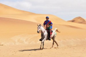 Gawie Viljoen riding Zabubega Manna in the dunes at Walvis Bay