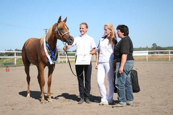 Handler Anni Elisabeth Piirfeldt, breeder Astra Nilk, owner Elle Lassi